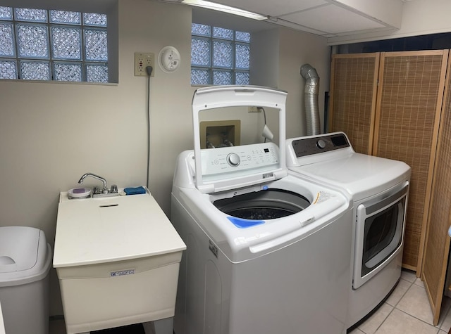 7641 W Hortense Ave, Chicago, IL 60631 - washroom with separate washer and dryer and light tile patterned floors