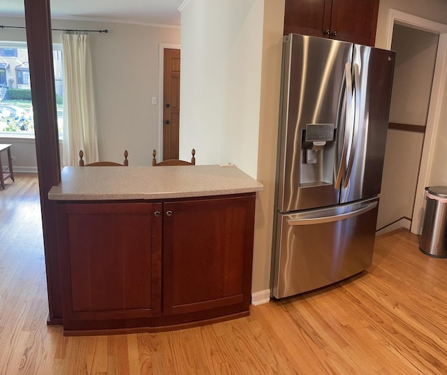 7641 W Hortense Ave, Chicago, IL 60631 - kitchen featuring stainless steel fridge with ice dispenser, ornamental molding, a peninsula, and light wood-style floors