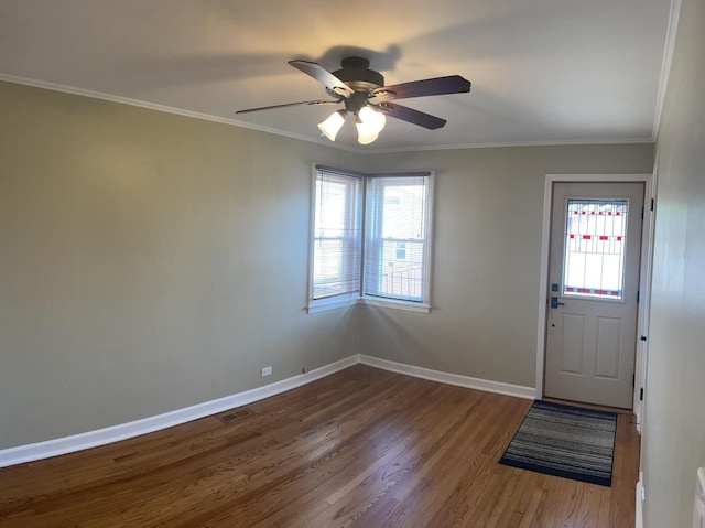 7641 W Hortense Ave, Chicago, IL 60631 - foyer with wood finished floors, healthy amount of natural light, a ceiling fan, and ornamental molding