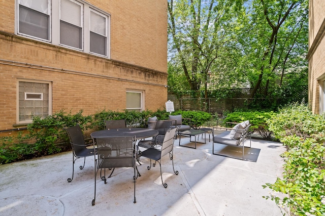4240 N Clarendon Ave Unit 405S, Chicago, IL 60613 - view of patio featuring outdoor dining space