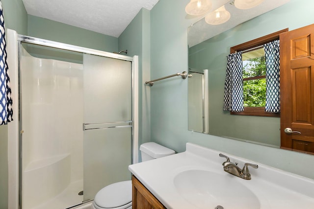 219 N Nina St, Cortland, IL 60112 - full bathroom with a shower stall, vanity, and a textured ceiling