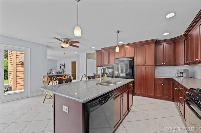 978 Merrimac Cir, Naperville, IL 60540 - kitchen with dishwashing machine, freestanding refrigerator, light tile patterned flooring, gas stove, and recessed lighting