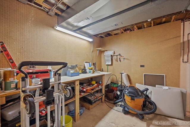 978 Merrimac Cir, Naperville, IL 60540 - miscellaneous room featuring a workshop area and unfinished concrete flooring