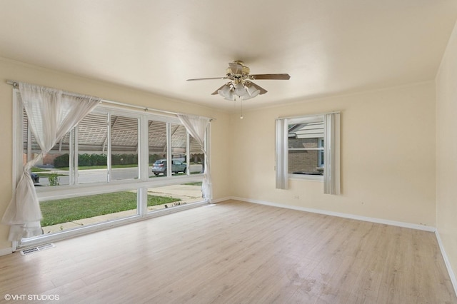 1113 Bristol Ave, Westchester, IL 60154 - spare room with wood finished floors and a ceiling fan