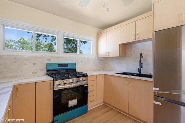 1113 Bristol Ave, Westchester, IL 60154 - kitchen with appliances with stainless steel finishes, tasteful backsplash, light brown cabinets, light countertops, and light wood-style floors