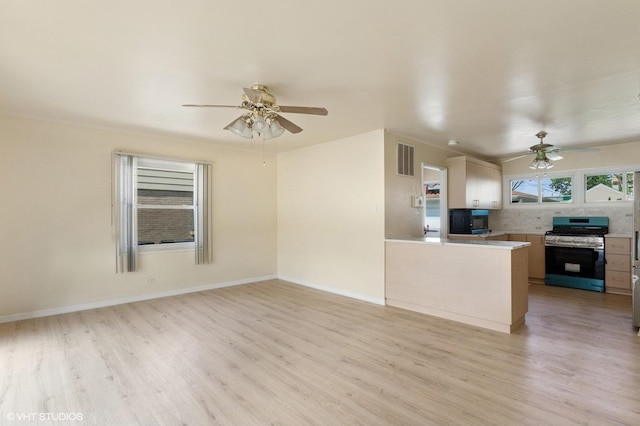 1113 Bristol Ave, Westchester, IL 60154 - unfurnished living room with ceiling fan and light wood-type flooring