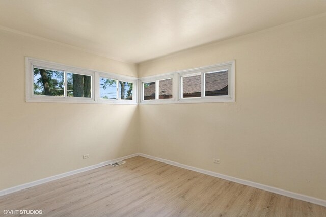 1113 Bristol Ave, Westchester, IL 60154 - spare room with light wood-type flooring and baseboards