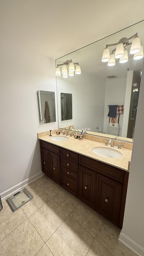 1841 S Calumet Ave Unit 2102, Chicago, IL 60616 - bathroom with double vanity and tile patterned floors