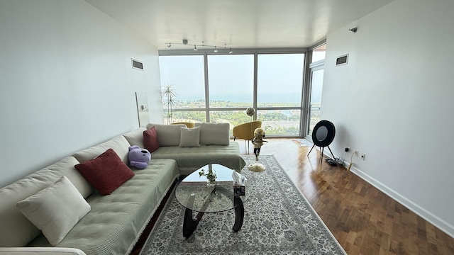 1841 S Calumet Ave Unit 2102, Chicago, IL 60616 - living area featuring a wall of windows, track lighting, wood finished floors, and a water view