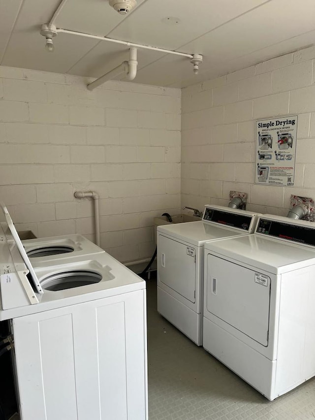 2315 E Olive St Unit 3G, Arlington Heights, IL 60004 - community laundry featuring separate washer and dryer and concrete block wall