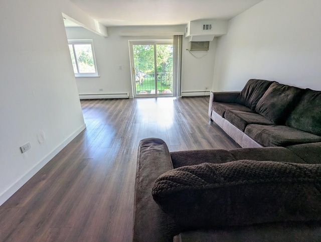 2315 E Olive St Unit 3G, Arlington Heights, IL 60004 - living room featuring baseboard heating, a baseboard heating unit, and dark wood-style flooring