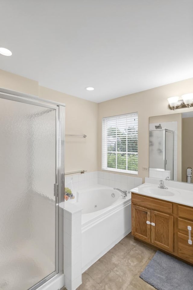 1850 Maureen Dr, Hoffman Estates, IL 60192 - full bath with a stall shower, vanity, a bath, and tile patterned flooring