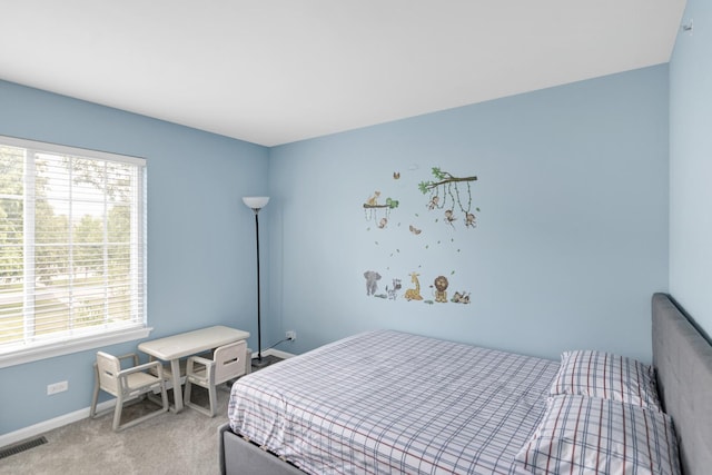 1850 Maureen Dr, Hoffman Estates, IL 60192 - carpeted bedroom featuring multiple windows