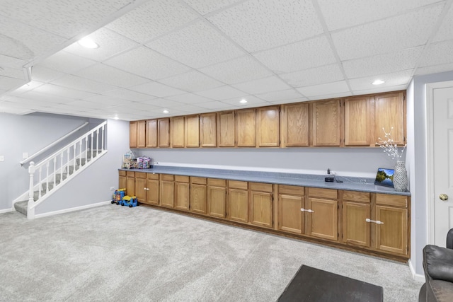 1850 Maureen Dr, Hoffman Estates, IL 60192 - kitchen featuring brown cabinets, light colored carpet, a paneled ceiling, and recessed lighting