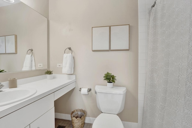 1315 W Webster Ave, Chicago, IL 60614 - bathroom with vanity, a shower with shower curtain, and tile patterned floors