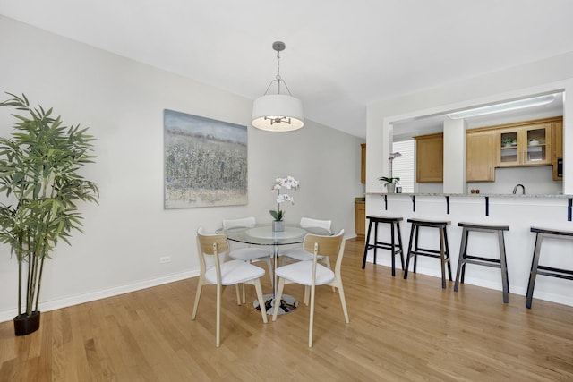 1315 W Webster Ave, Chicago, IL 60614 - dining room featuring baseboards and light wood finished floors