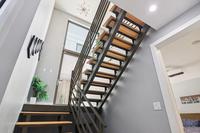 1529 W Chestnut St Unit 102, Chicago, IL 60642 - stairway with a chandelier