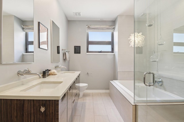 1529 W Chestnut St Unit 102, Chicago, IL 60642 - full bath featuring tiled tub, a shower with door, and double vanity