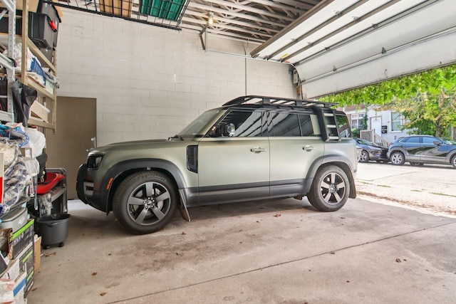 1529 W Chestnut St Unit 102, Chicago, IL 60642 - garage featuring concrete block wall