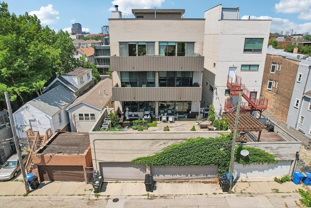 1529 W Chestnut St Unit 102, Chicago, IL 60642 - view of property with a garage