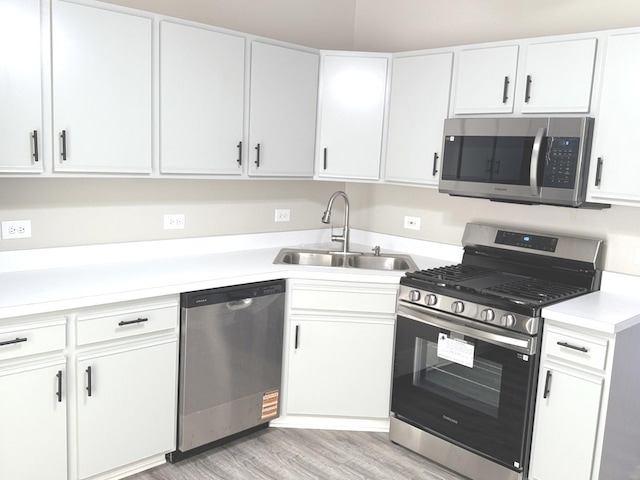1411 Berta Dr Unit 2N, Crest Hill, IL 60403 - kitchen with stainless steel appliances, light countertops, and white cabinetry