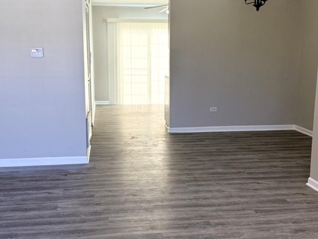 1411 Berta Dr Unit 2N, Crest Hill, IL 60403 - unfurnished room featuring dark wood-type flooring and a ceiling fan
