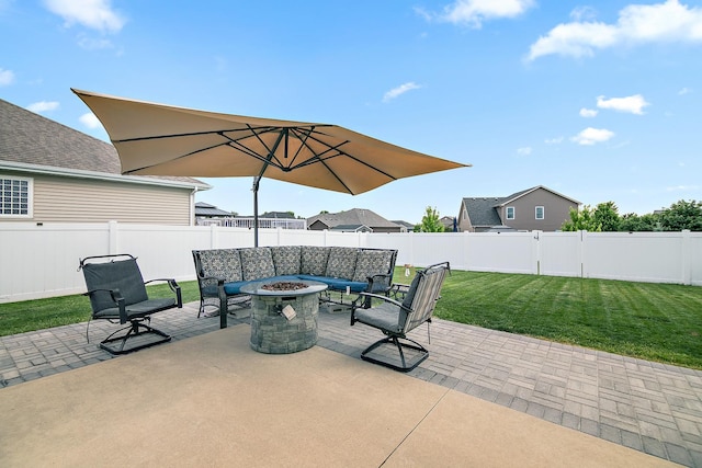 2225 Prairie Chase Dr, Bourbonnais, IL 60914 - fenced backyard featuring a patio and an outdoor living space with a fire pit
