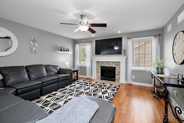 2225 Prairie Chase Dr, Bourbonnais, IL 60914 - living area with ceiling fan, wood-type flooring, and a fireplace
