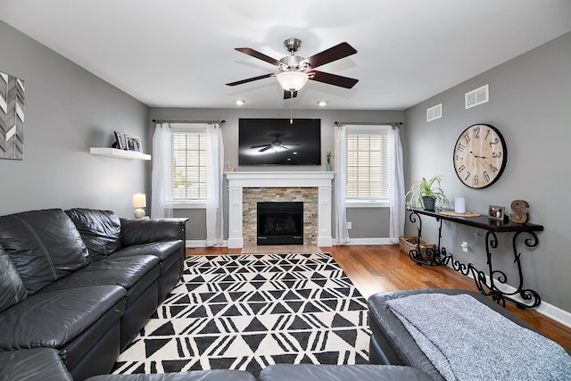 2225 Prairie Chase Dr, Bourbonnais, IL 60914 - living area with a ceiling fan, wood finished floors, plenty of natural light, and a fireplace