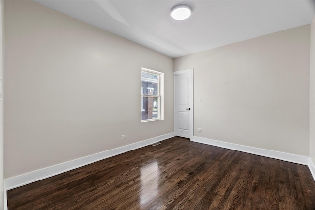 1706 S 9th Ave, Maywood, IL 60153 - unfurnished room with dark wood-style floors and baseboards