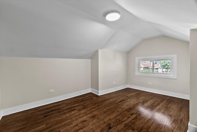 1706 S 9th Ave, Maywood, IL 60153 - additional living space featuring lofted ceiling and dark wood-style flooring