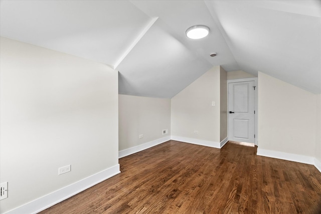 1706 S 9th Ave, Maywood, IL 60153 - additional living space featuring lofted ceiling and dark wood-type flooring