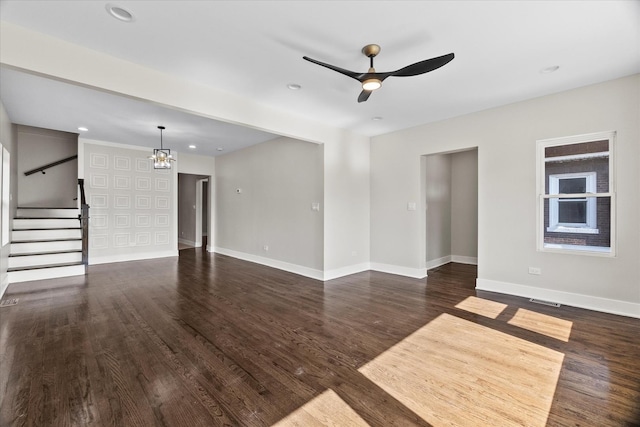 1706 S 9th Ave, Maywood, IL 60153 - unfurnished living room with a ceiling fan, stairway, dark wood-style flooring, recessed lighting, and a chandelier