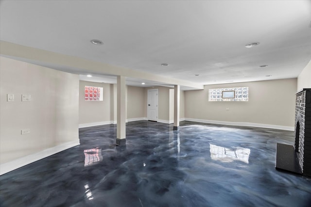 1706 S 9th Ave, Maywood, IL 60153 - below grade area featuring a brick fireplace and recessed lighting