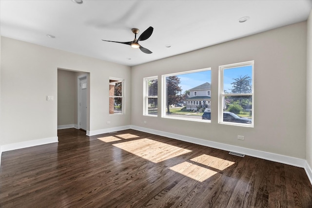 1706 S 9th Ave, Maywood, IL 60153 - spare room with a ceiling fan and dark wood-type flooring