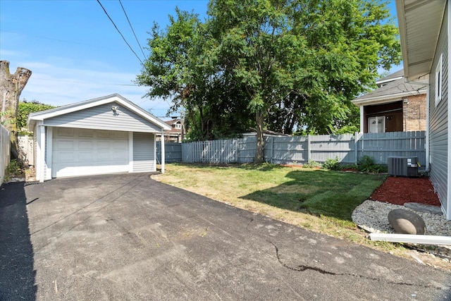 1706 S 9th Ave, Maywood, IL 60153 - view of yard with a garage, an outbuilding, and driveway