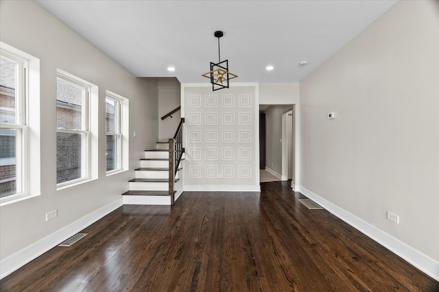 1706 S 9th Ave, Maywood, IL 60153 - unfurnished living room featuring stairway, a chandelier, dark wood-type flooring, and recessed lighting