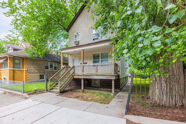 5347 S Racine Ave, Chicago, IL 60609 - view of front facade with covered porch, stairs, and cooling unit