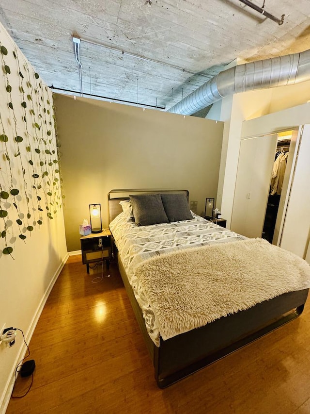 900 N Kingsbury St Unit 861, Chicago, IL 60610 - bedroom featuring wood finished floors and baseboards