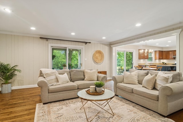 870 Georgetowne Ln, Barrington, IL 60010 - living room with crown molding, wood finished floors, a chandelier, and recessed lighting