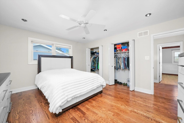 14424 S Pheasant Ln, Homer Glen, IL 60491 - bedroom with light wood finished floors, recessed lighting, a ceiling fan, and multiple closets