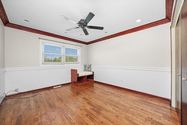 14424 S Pheasant Ln, Homer Glen, IL 60491 - unfurnished room with crown molding, wood finished floors, and a ceiling fan