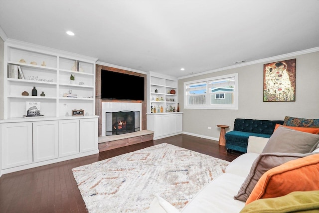 14424 S Pheasant Ln, Homer Glen, IL 60491 - living area featuring ornamental molding, dark wood-style floors, a large fireplace, and recessed lighting