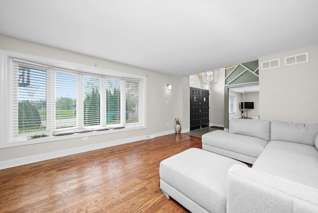 14424 S Pheasant Ln, Homer Glen, IL 60491 - living area with baseboards and wood finished floors