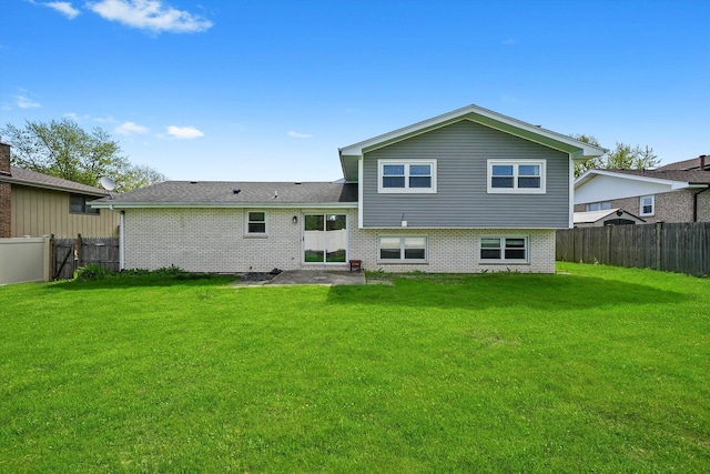 14424 S Pheasant Ln, Homer Glen, IL 60491 - back of house featuring a fenced backyard, brick siding, and a patio area