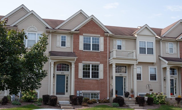 895 Clover Ln Unit 895, Pingree Grove, IL 60140 - multi unit property featuring brick siding and a shingled roof