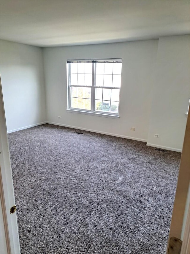 895 Clover Ln Unit 895, Pingree Grove, IL 60140 - carpeted spare room featuring baseboards