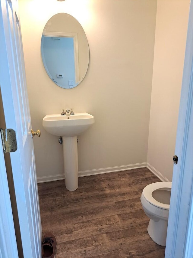 895 Clover Ln Unit 895, Pingree Grove, IL 60140 - bathroom featuring wood finished floors and toilet