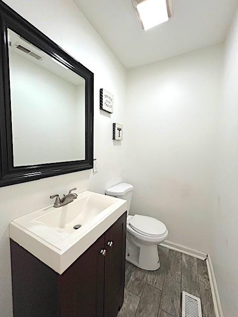 534 White Oak Rd, Bolingbrook, IL 60440 - bathroom with wood finished floors and vanity