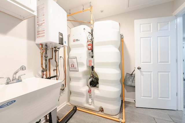74 Marquette St, Park Forest, IL 60466 - utilities featuring tankless water heater and a sink
